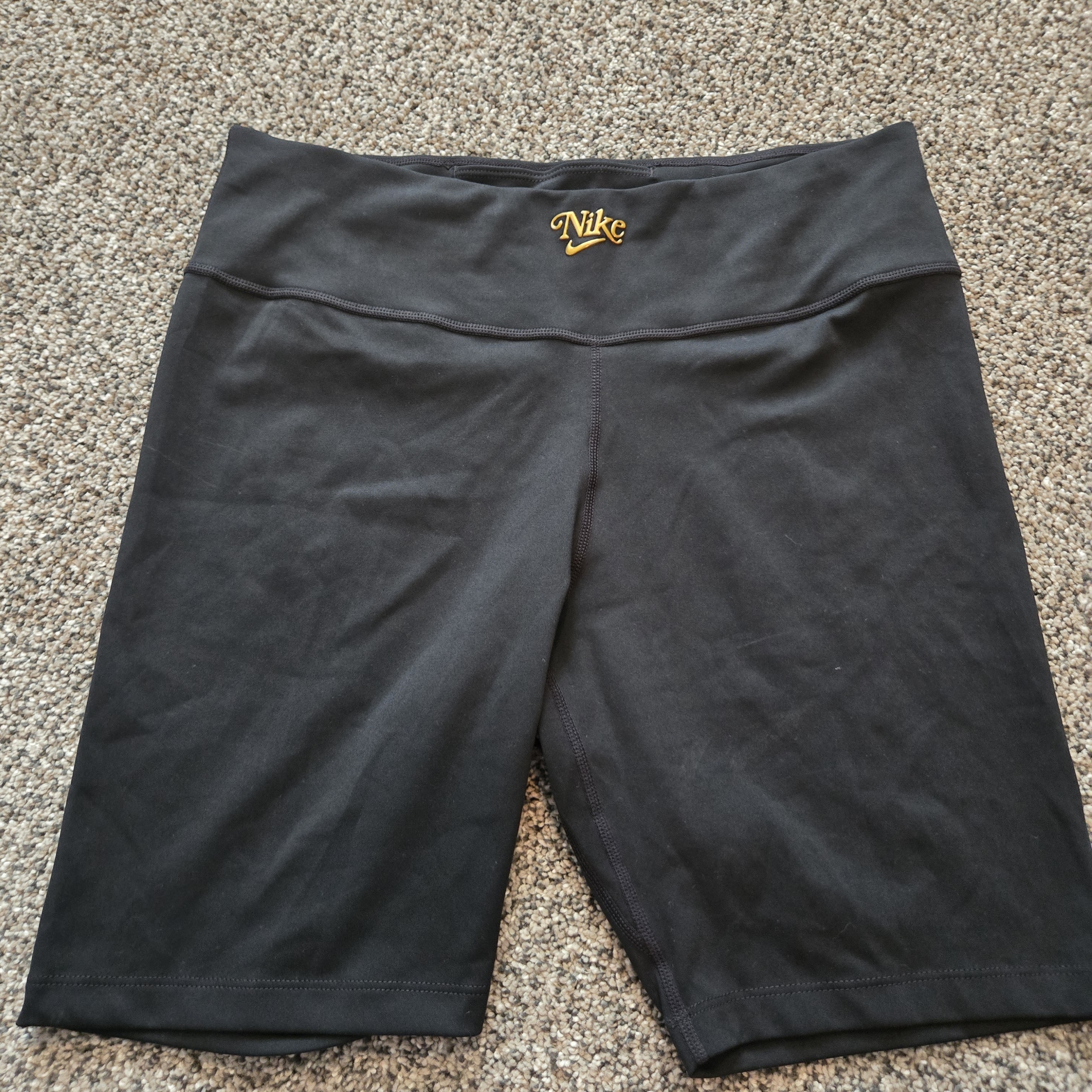 Nike Women's Black Bike Shorts With Gold Logo